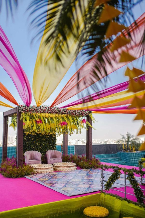 Radisson Blu Hotel New Delhi Dwarka Exteriér fotografie A mandap decorated with colourful fabrics